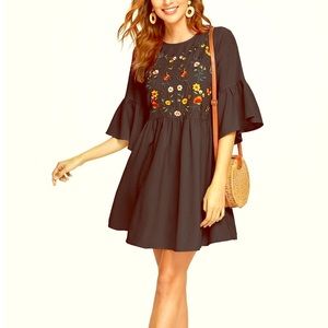 Embroidered black dress